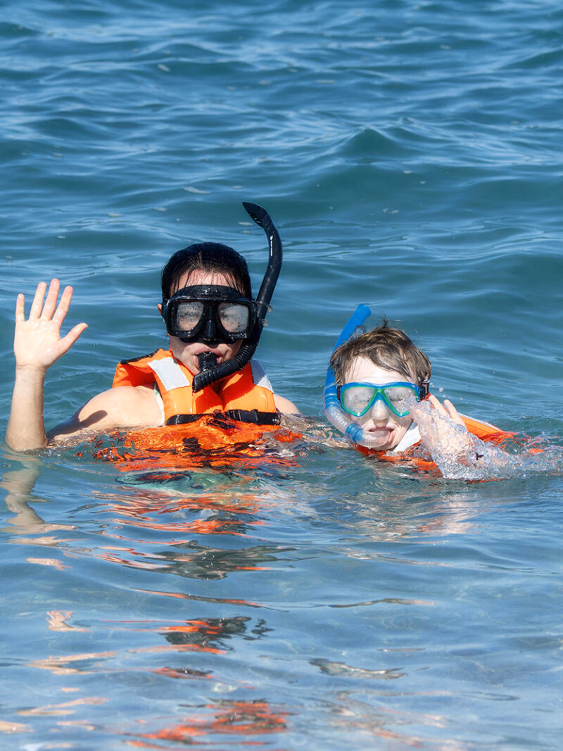 Snorkeling in the ocean as part of luxury Latin America family holidays.