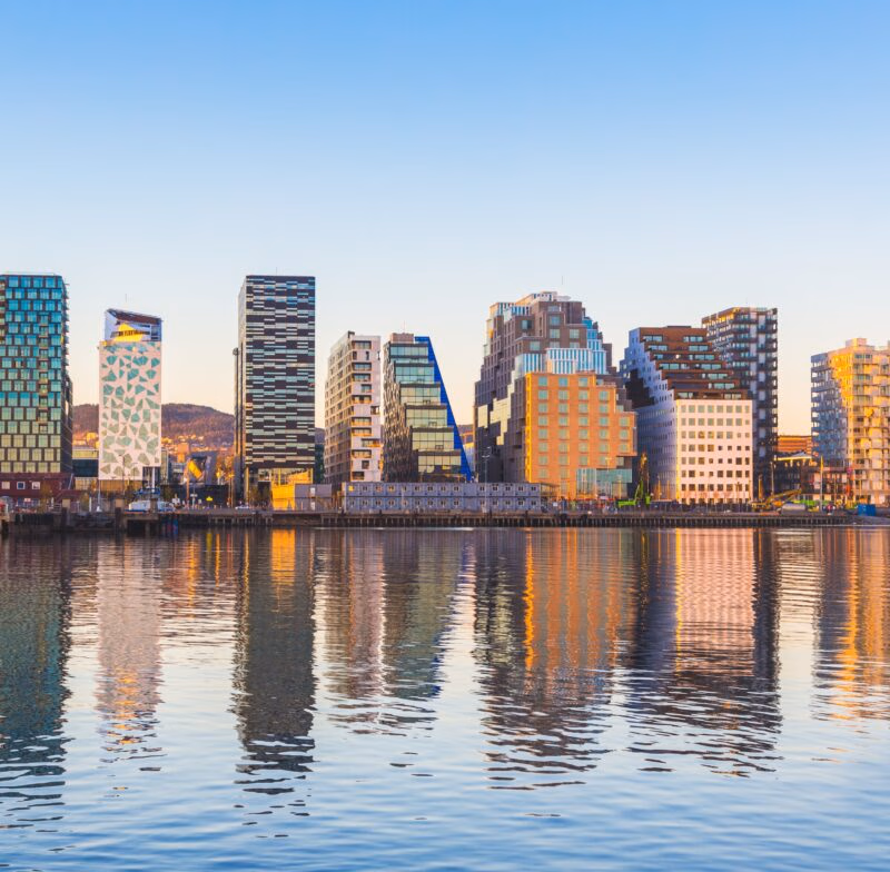 Modern buildings in Oslo, Norway, with their reflection into the water.