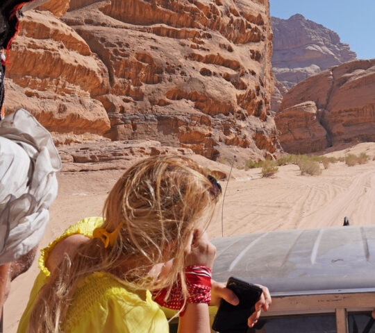 Jordan, The Wadi Rum Desert - tourist visiting the desert