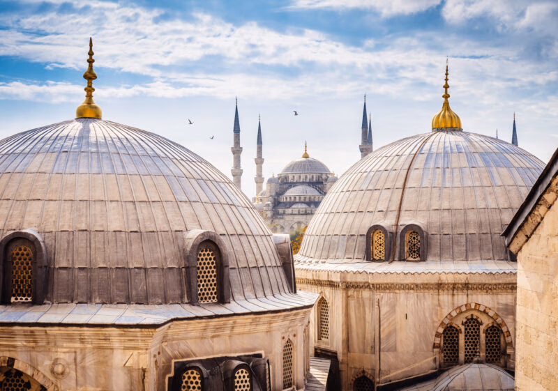 The grey domes and tall minarets of the Blue Mosque in Istanbul seen on luxury Turkey Asia tours.