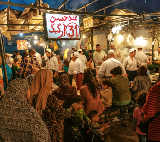 Djemma el fan square, the famous night food market in the centre of Marrakesh's Medina, Morroco, West Africa. Many traditional food sellers are cooking every night for the tourists and Moroccan people