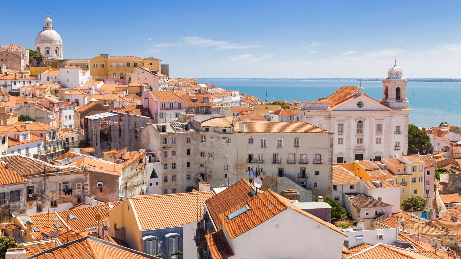 Panoramic view of Alfama rooftops in Lisbon, Portugal