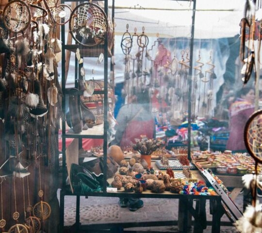 Dreamcatchers hanging from a stall at the weekend market in Pisac, Peru