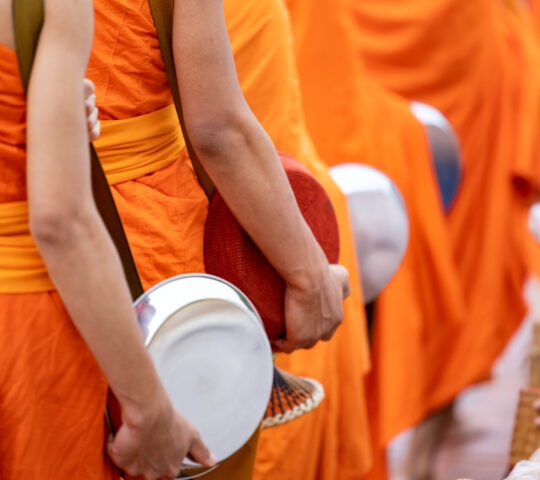 Buddhist monks at an alms giving ceremony in Luang Prabang, Laos