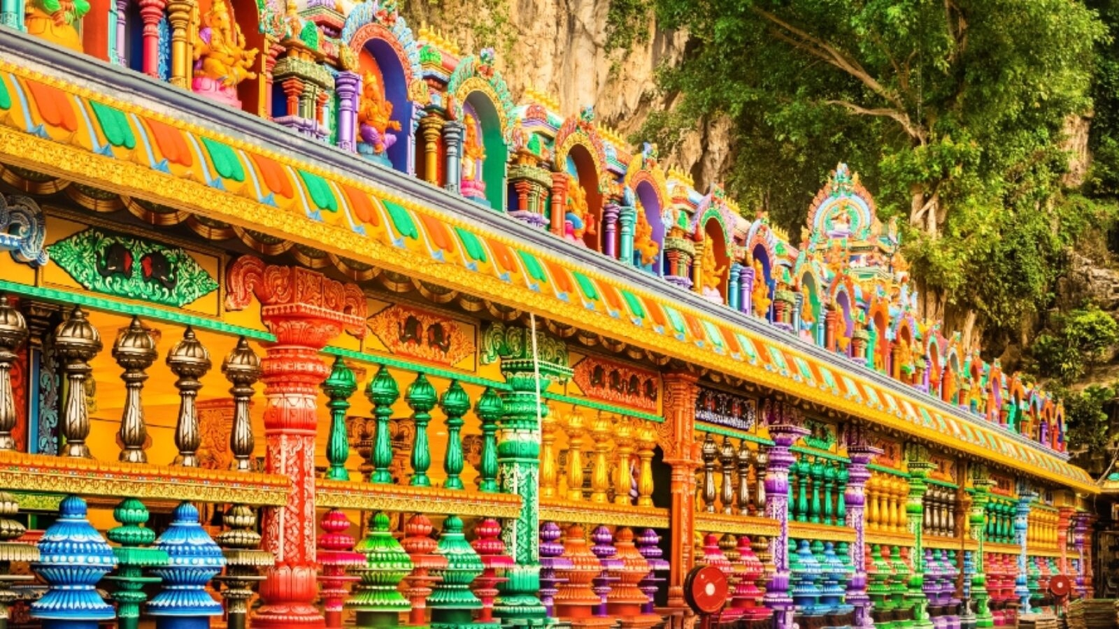 Colorful and intricate Hindu temple architecture in Malaysia on luxury Asia grand tour vacations.