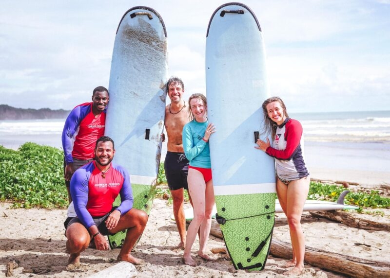 surfers with surfboards