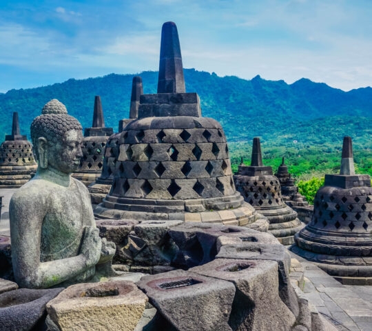 The statue of Buddha on the temple of Borobudur. Indonesia