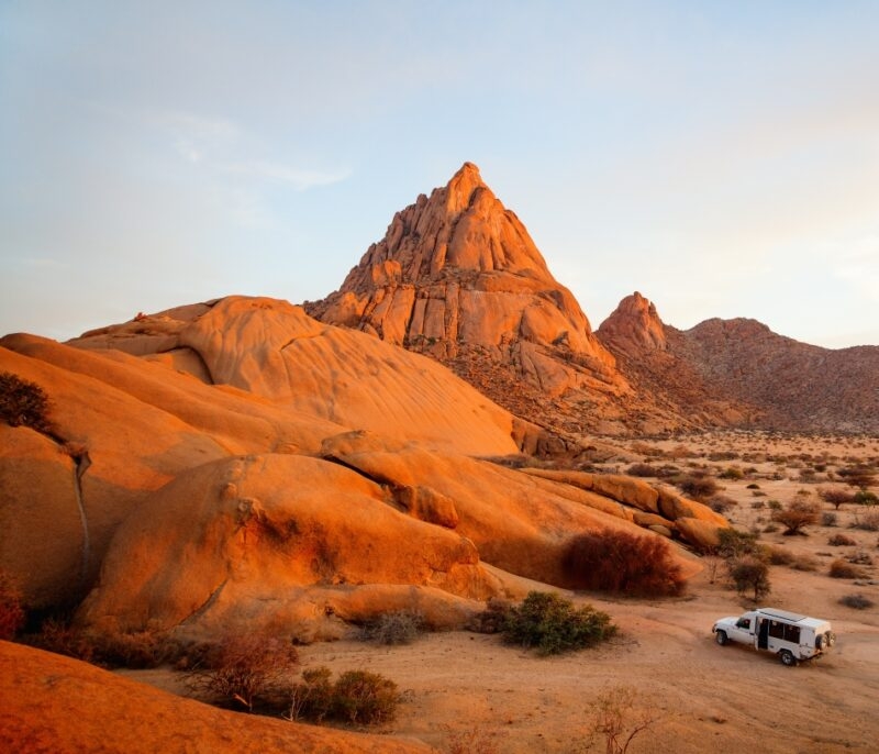 Beautiful sunset over Spitzkoppe area with picturesque stone arches and unique rock formations in Damaraland Namibia