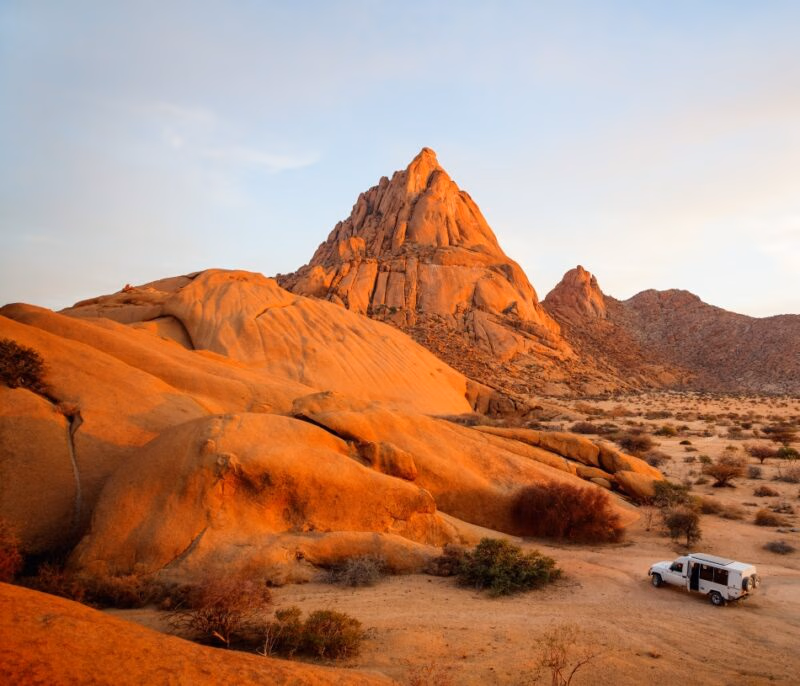 Beautiful sunset over Spitzkoppe area with picturesque stone arches and unique rock formations in Damaraland Namibia
