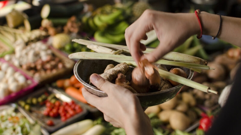 Buying fresh food and vegetables on vietnamese street market