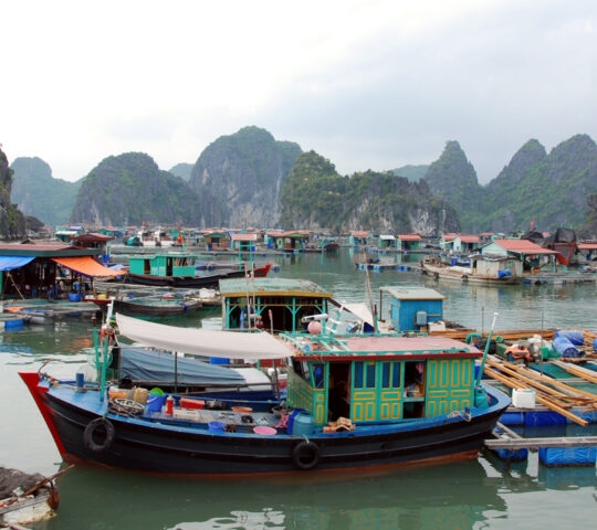 a floating fisherman's village in ha long bay, northern vietnam