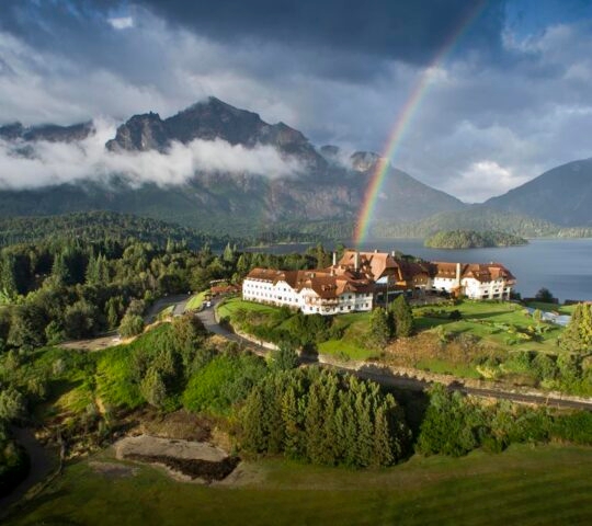 Aerial view of Llao Llao Resort in Argentina, with a rianbow