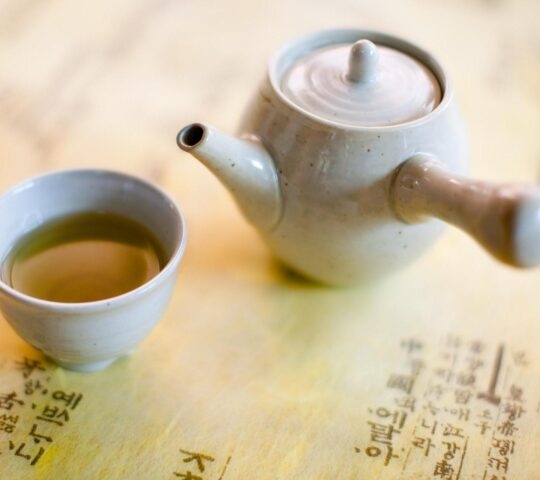 Equipment for east asian tea ceremony on the paper of Korean ancient alphabet