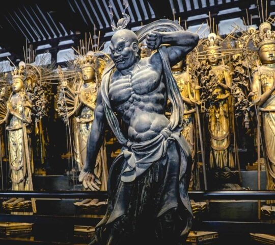 Guardian and Thousand Armed Kannon sculptures at Buddhist temple (Sanjusangendo Temple), Kyoto