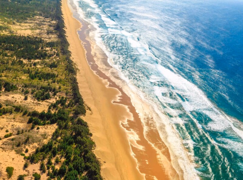 Indian ocean background. Scenic flight of east coast of South Africa in Sodwana Bay National Park within the iSimangaliso Wetland Park, Maputaland, KwaZulu-Natal area.
