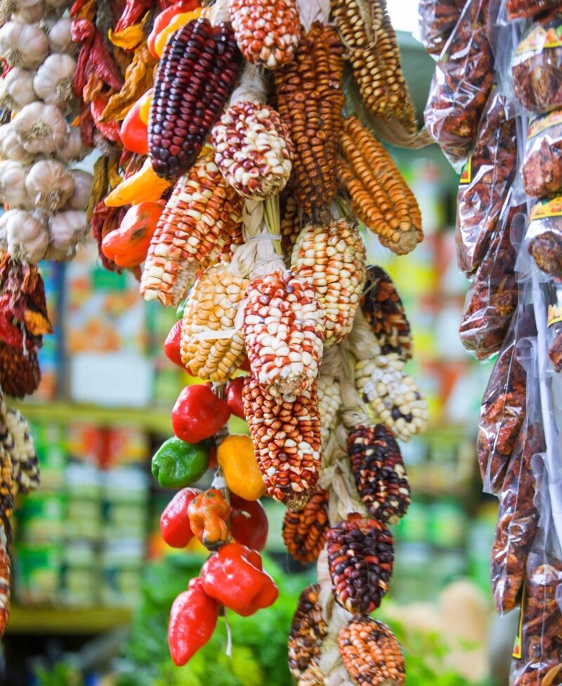 Several traditional varieties of corn on a marketplace in Lima