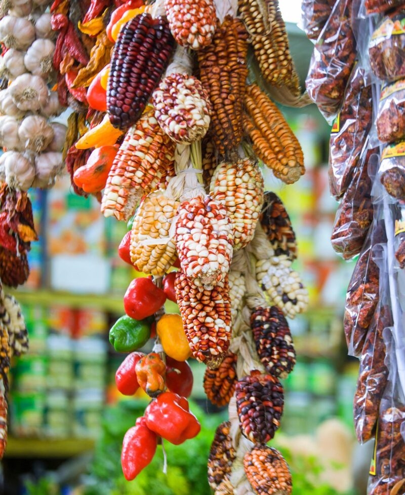 Several traditional varieties of corn on a marketplace in Lima