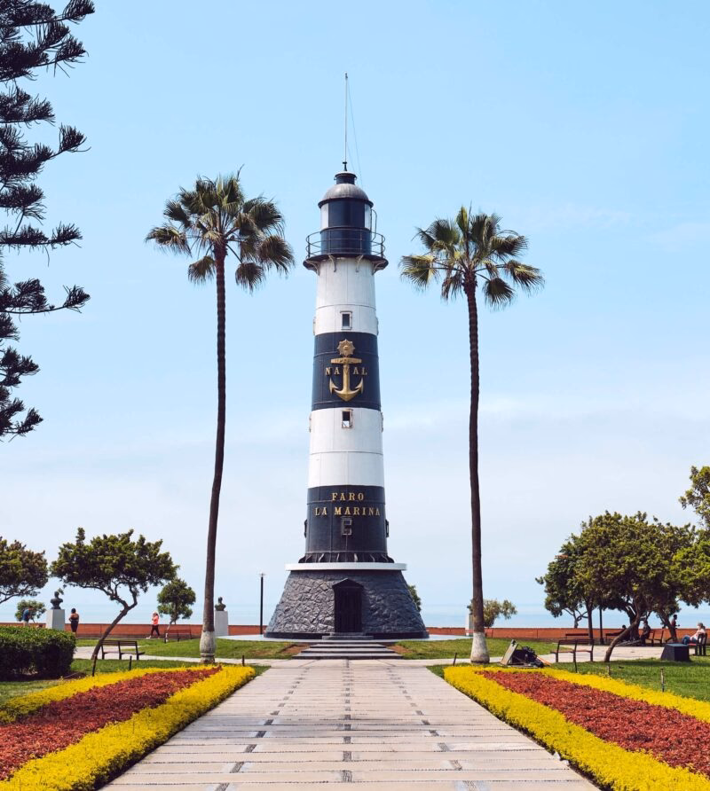 La Marina Lighthouse on a background of sky in the park. Miraflores district, Lima, Peru.