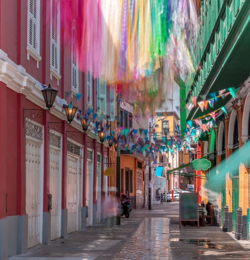 Monumental Callao is one of the new fashion areas near Lima timelapse. Walking street with colorful houses and restaurants. Lima Peru.