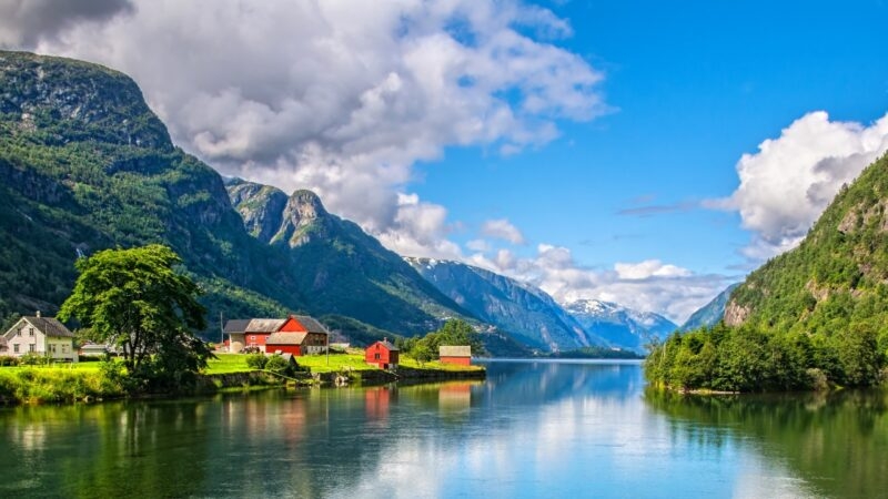 Amazing nature view with fjord and mountains. Beautiful reflection.