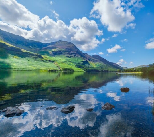 Mountains reflected on Lake Windermere at the Lake District