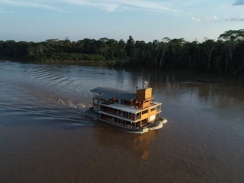 An aerial view of cruising vessel Delfin I in the Peruvian Amazon.