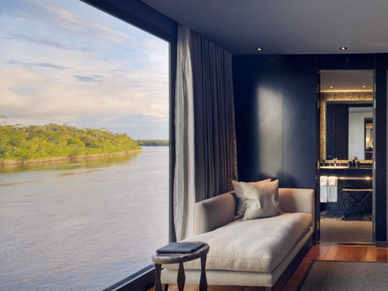 One of Aqua Nera's luxurious suites, with enormous picture windows overlooking the Peruvian Amazon.