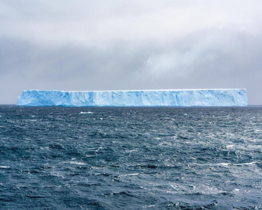 Big blue Iceberg floating between the Antarctic Peninsula and Drake Passage.