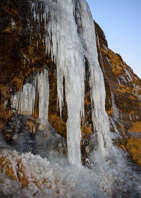 Frozen waterfall in Iceland during winter