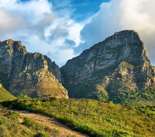 A hiking trail in South Africa going up a mountain.