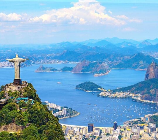 Aerial view of Rio de Janeiro with Christ Redeemer and Corcovado Mountain. Brazil.
