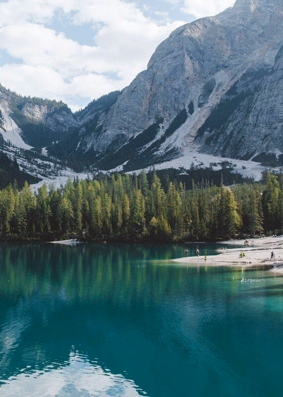 The Dolomites in Italy in a sunny day enjoying bathing and swimming