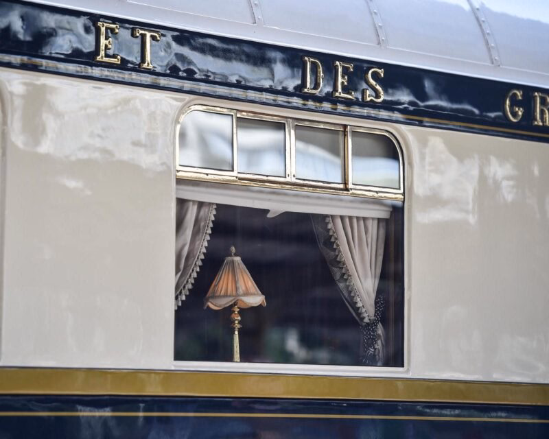 Famous Orient Express long distance passenger train stopped in Bucharest central train station