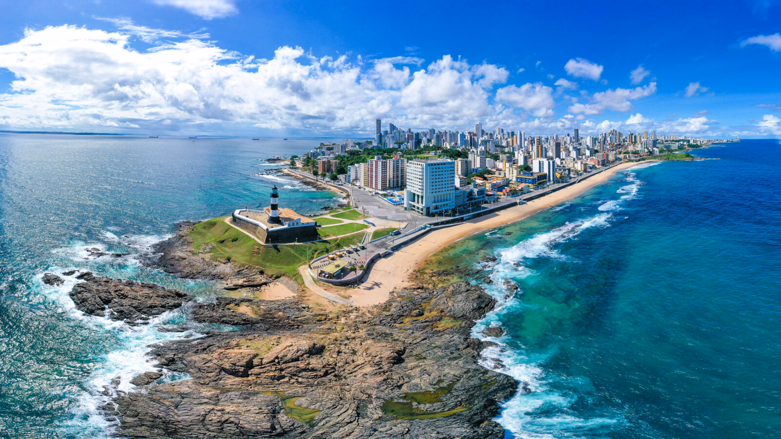 Aerial view of lighthouse in the tropical Salvador Bahia Brazil coast, sea, beach, water, island, ocean, blue, view, landscape, sky, summer, travel, nature, vacation, coastline, bay, tropical, sand, tourism, seascape, beautiful, aerial, greece, mediterranean, resort, lighthouse, salvador, bahia, brazil, fort, museum, landmark Areal view of Salvador Brazil