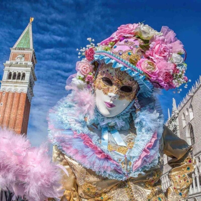 A person in an elaborate mask for Venice carnival