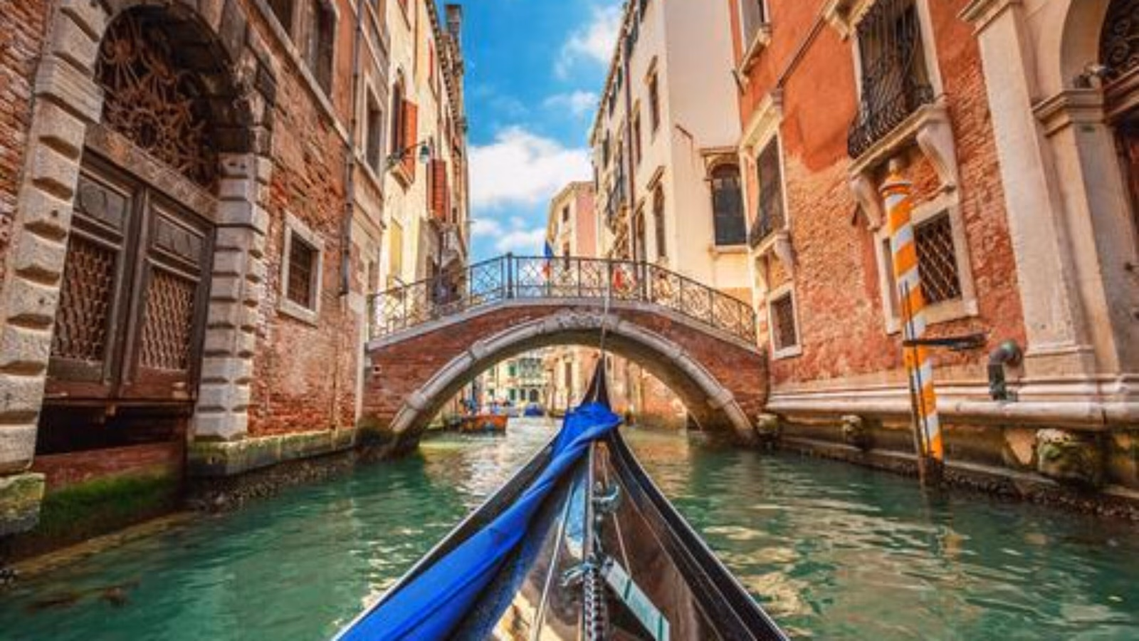 View from gondola during the ride through the canals of Venice in Italy