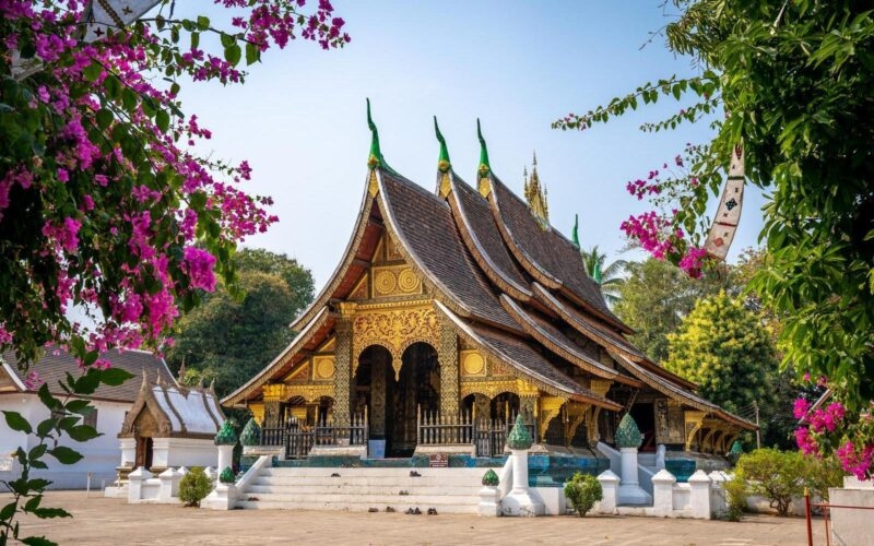 Wat Xieng Thong temple with blue sky, Luang Prabang, Laos