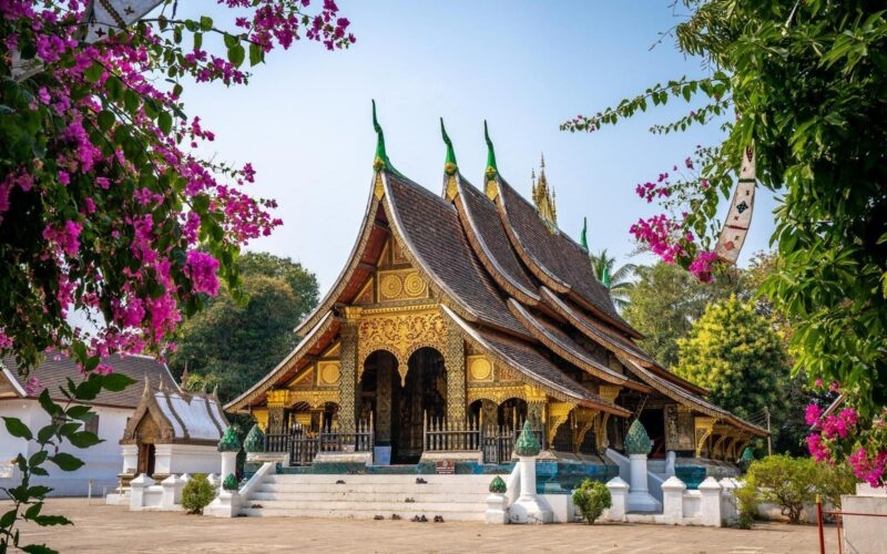 Wat Xieng Thong temple with blue sky, Luang Prabang, Laos
