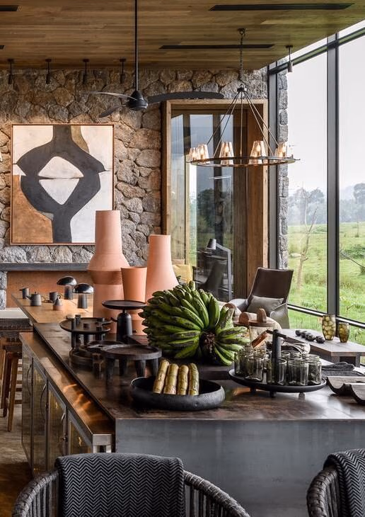 Tropical produce displayed at the bar of Singita Kwitonda Lodge in Rwanda, breakfast served near Sasaab in Kenya’s Samburu National Reserve and fresh vegetables harvested in the garden at Lewa Wilderness.