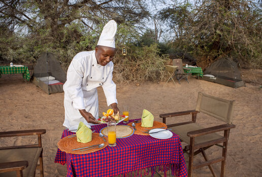 Tropical produce displayed at the bar of Singita Kwitonda Lodge in Rwanda, breakfast served near Sasaab in Kenya’s Samburu National Reserve and fresh vegetables harvested in the garden at Lewa Wilderness.