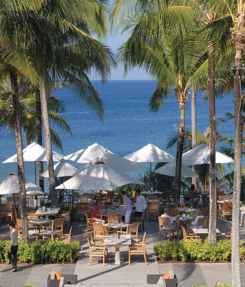 Open-air dining with ocean views at Trisara in Phuket and wine tasting in the candlelit rock cellar at Six Senses Ninh Van Bay in Vietnam.