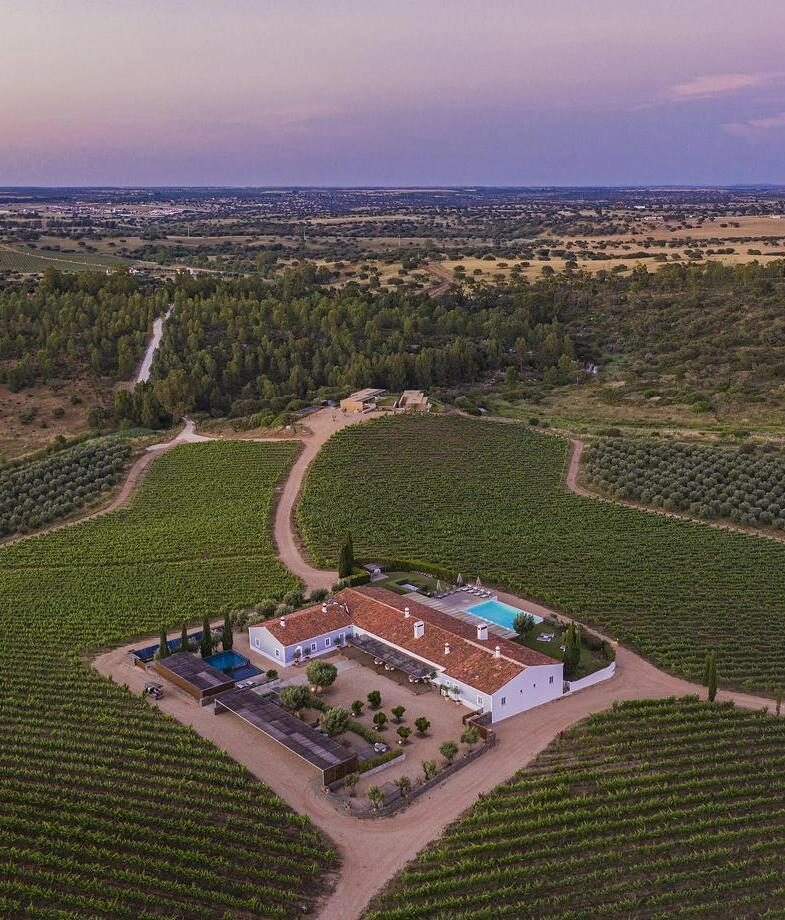 The stylish interior of Stamba Hotel in Tbilisi and the vineyard-surrounded estate of Herdade da Malhadinha Nova in Alentejo region.