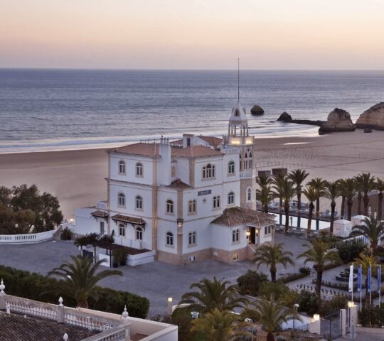 View of Hotel Bela Vista with the beach in the background