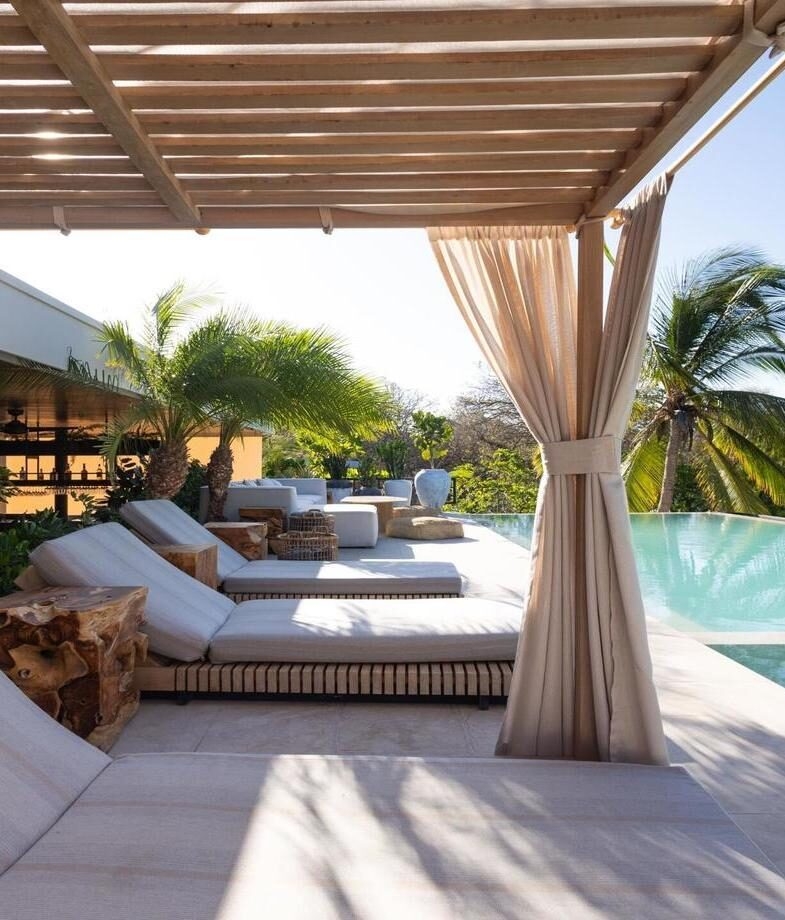 The poolside cabanas at Silvestre on the Nicoya Peninsula and a beautiful hike along Río Celeste in Tenorio Volcano National Park.