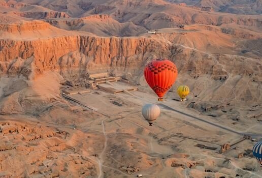 The vast plains of the Serengeti National Park, the temples and desert valleys of Luxor and drifting over Cappadocia’s fairy chimneys.