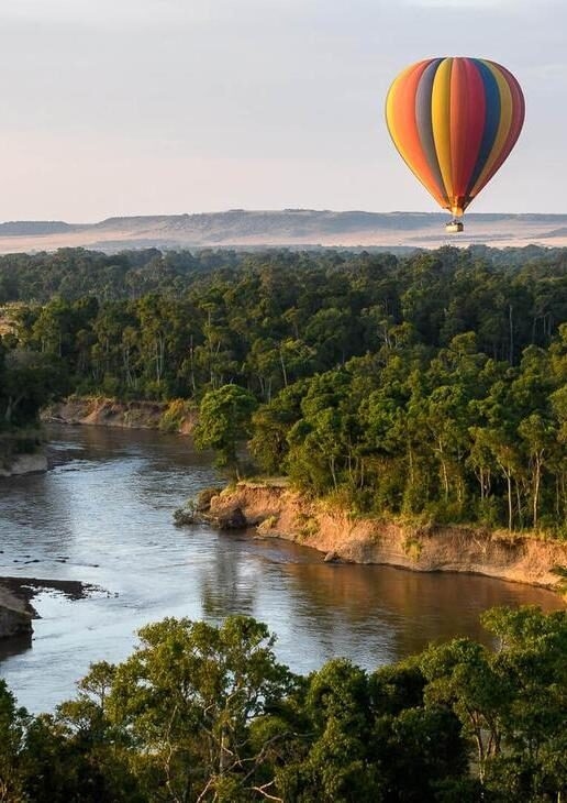 The snow-capped peaks and calm waters of Lake Wakatipu in Queenstown, drifting past the Château de Chenonceau in the Loire Valley and soaring over the winding rivers and savannahs of the Maasai Mara.
