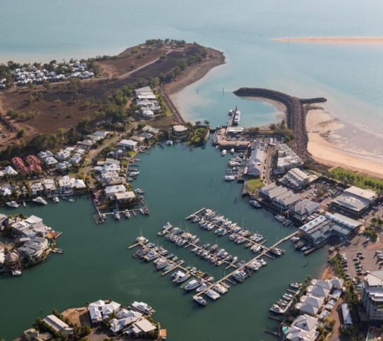 Aerial view of Cullen Bay, Darwin, showing marina and rock wall
