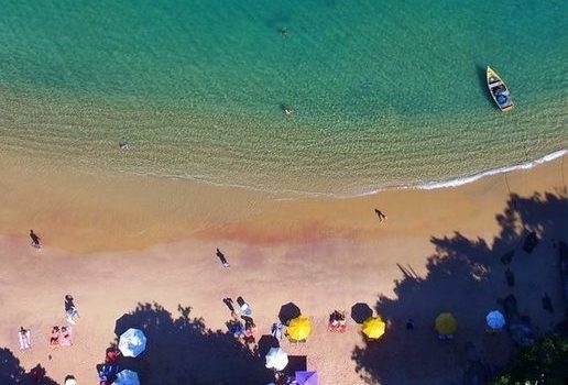 A jaguar spotted in the Pantanal, Samba drummers in Rio de Janeiro and a beach in Búzios