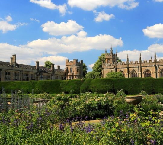 View of the gardens with flowers at Sudeley Castle in the Cotswolds