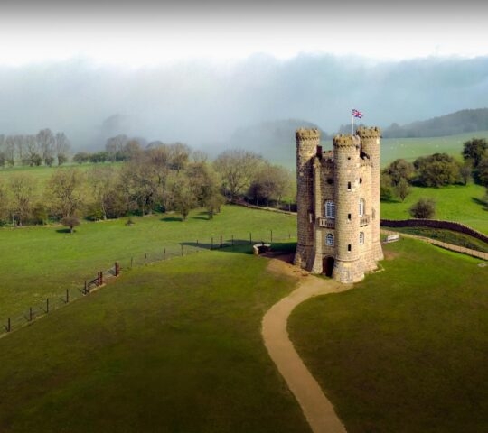 image of Broadway Tower with a misty sky